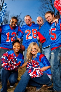 Group of friends wearing football jerseys